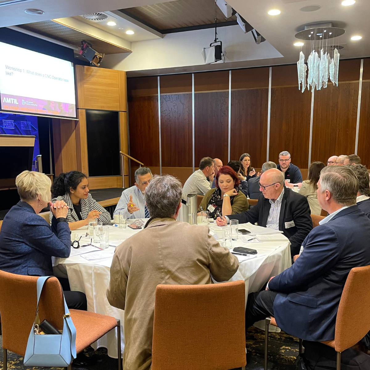 Skills Summit attendees participate in round table discussions